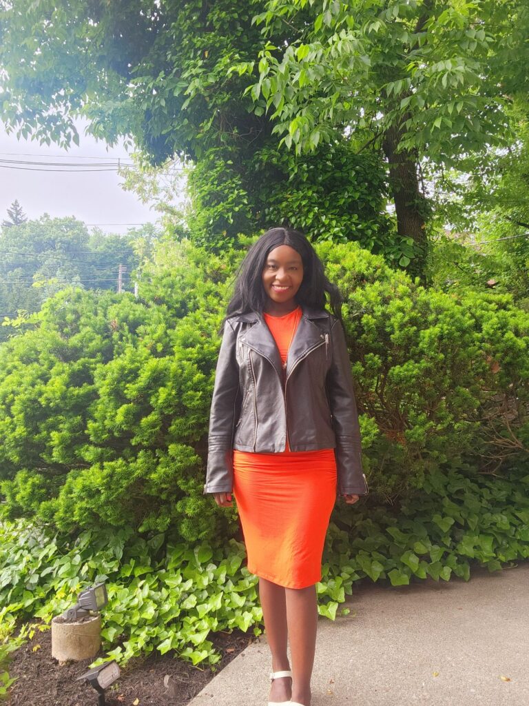 how to style an orange midi dress for warm weather