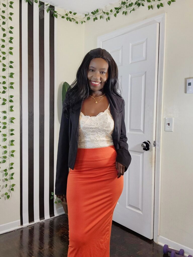 styling a white lace top with a red skirt and black blazer