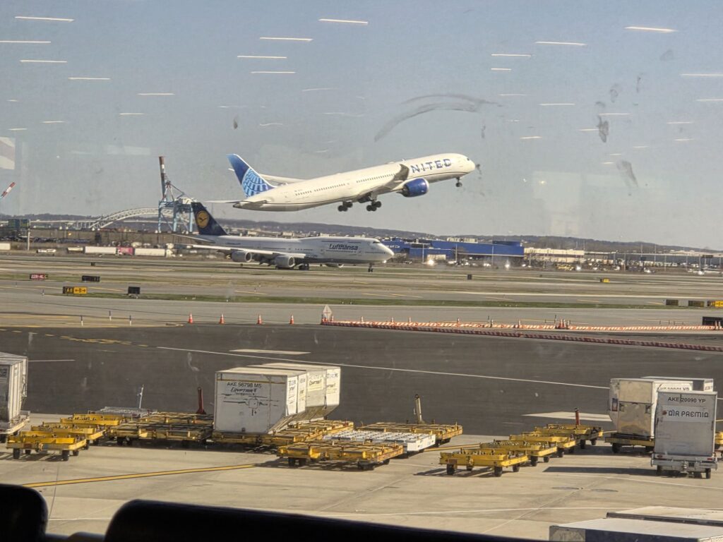 Watching a plane take off as vacation begins before visiting South Beach in Miami