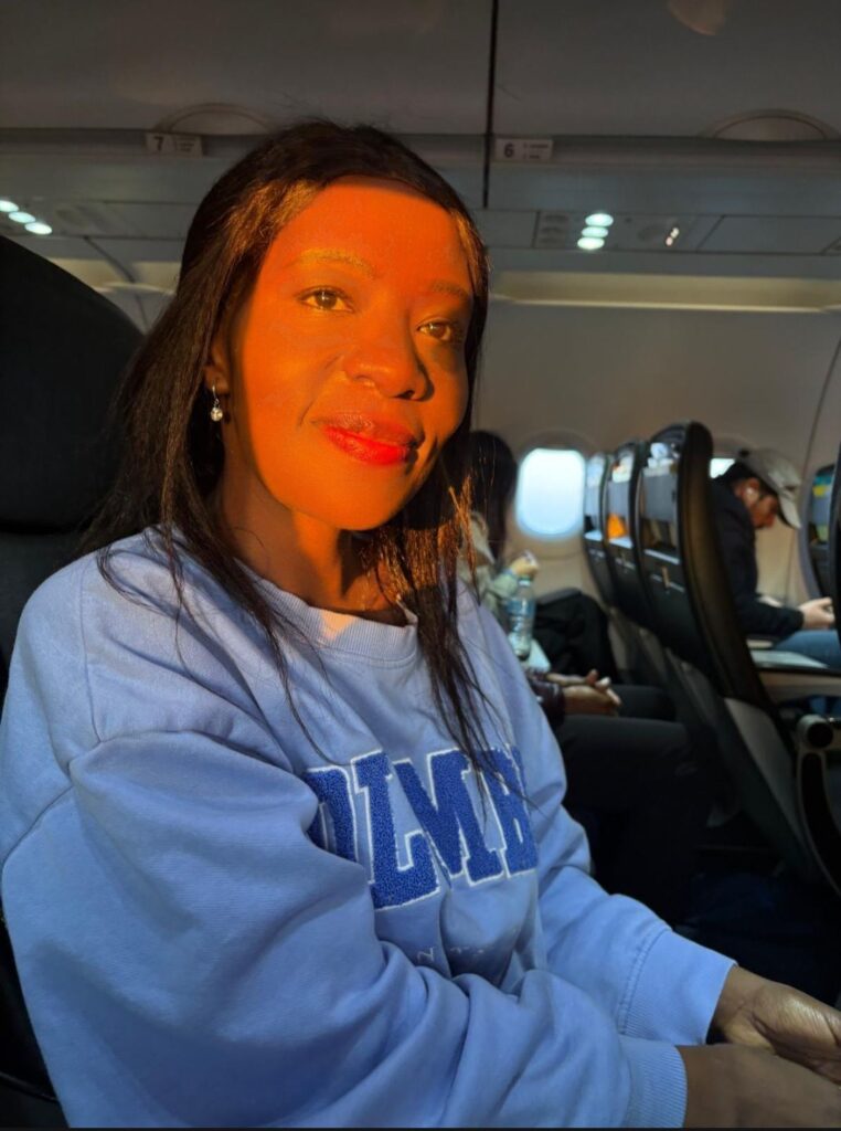 Passenger inside airplane excited to begin vacation